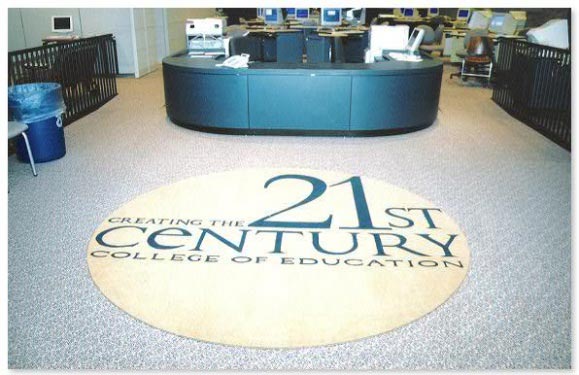 A circular rug with the words " creating the 2 1 st century college of education ".
