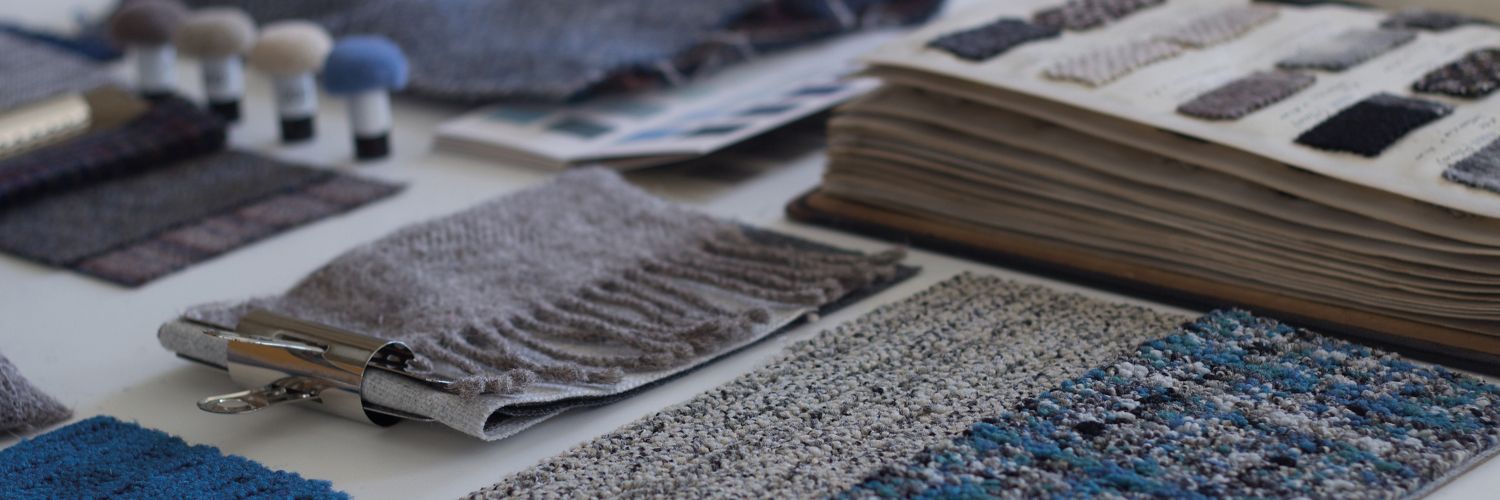 A close up of some rugs and papers