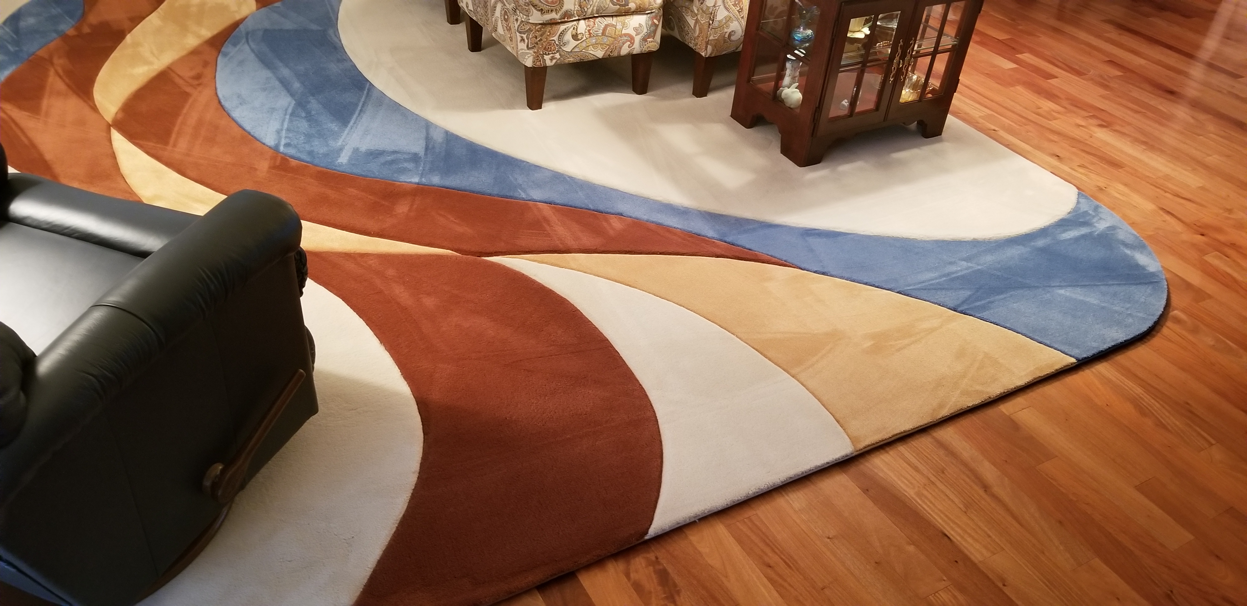 A rug with an abstract design on it