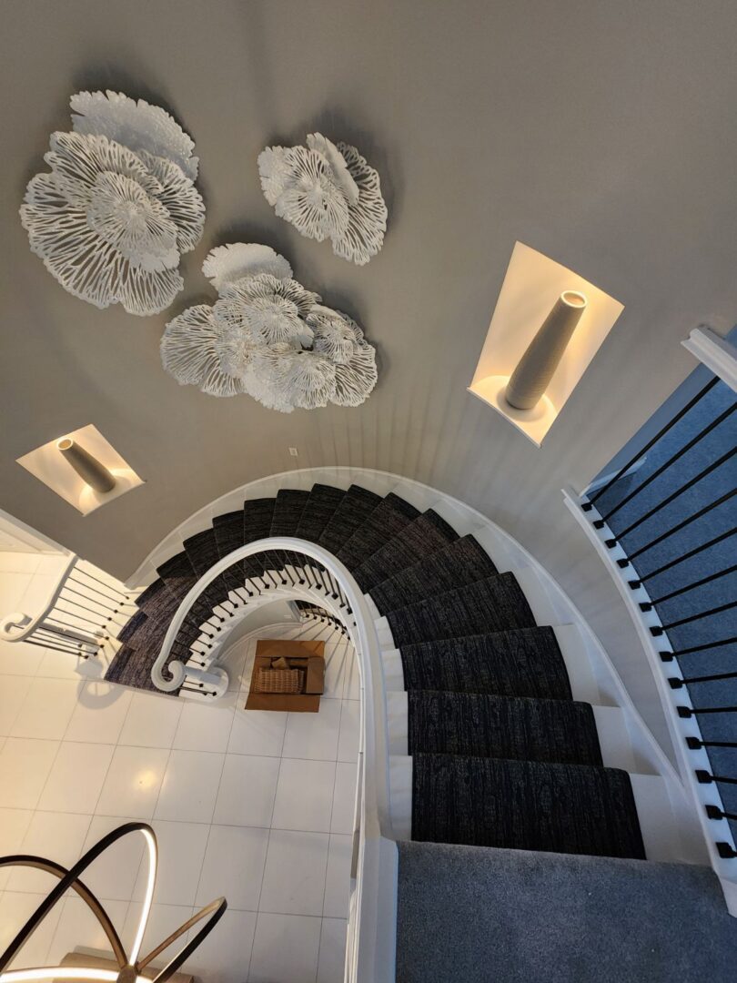 A staircase with a black and white theme
